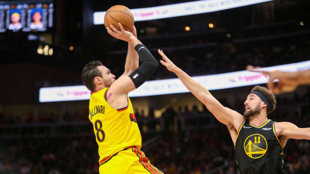 Mar 25, 2022; Atlanta, Georgia, USA; Atlanta Hawks forward Danilo Gallinari (8) shoots over Golden State Warriors guard Klay Thompson (11) in the second half at State Farm Arena.